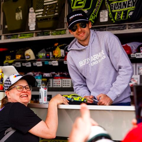 2023 NASCAR Cup Series champion Ryan Blaney signed autographs prior to the EchoPark Automotive Grand Prix NASCAR Cup Series race last year at Circuit of The Americas in Austin, Texas.