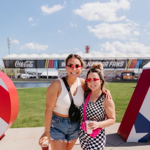 Race fans pose for a photo at Circuit of The Americas on Friday, March 22, 2024.