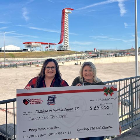 Speedway Children’s Charities Texas Chapter Executive Director Marissa Chaney (left) and Texas Motor Speedway/NASCAR at COTA Director of Guest Services Kayla Ochocki (right) presented $25,000 in grants to three Austin-area nonprofits.