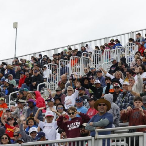 Race fans in the grandstands enjoying the 2024 EchoPark Automotive Grand Prix at Circuit of The Americas in Austin, Texas.